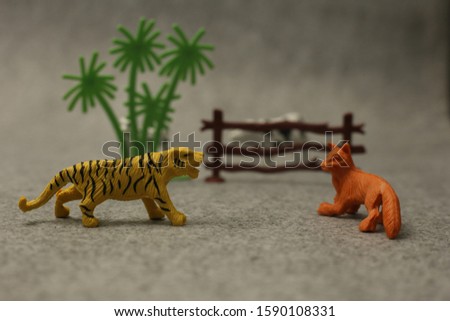 Animals miniature zoo background with tree 