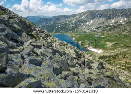 Bucura glacial lake seen from Custura Bucurei peak, Retezat Mountains National Park, Hunedoara, Transylvania, Romania.  27 June 2019