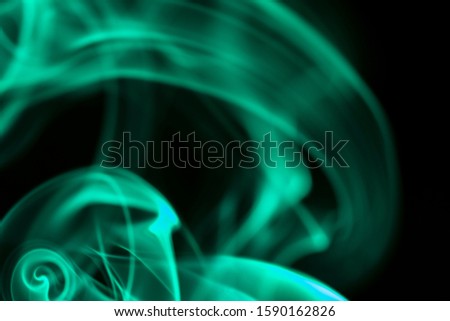 abstract background with blurred green smoke on black, smoky abstract background