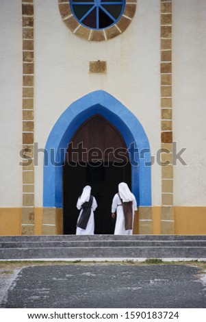 Nuns in front of the Church of Mouly, Ouvea Island, Loyalty Islands, New Caledonia, Overseas Territory of France