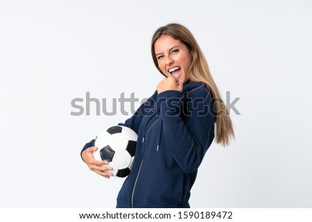 Young football player woman over isolated white background