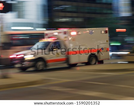 Blurred motion shot of ambulance, Chicago, Illinois, United States
