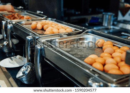 eggs in the kitchen of the restaurant scrambled egg yolk protein