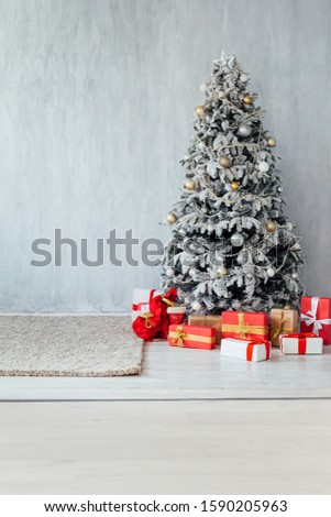 Christmas tree with decoration and gifts new year