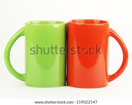Collection of colorful cups on the white background