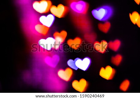 Festive overlay effect. Colorful heart bokeh festive glitter background. Christmas, New Year and Valentine's day design