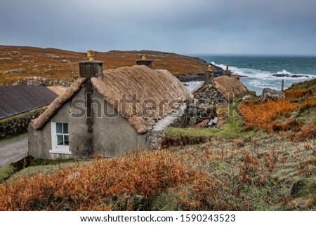 Scotland, Outer Hebrides, Lewis and Harris, Beautiful view of island, Gearrannan Blackhouse Village Royalty-Free Stock Photo #1590243523