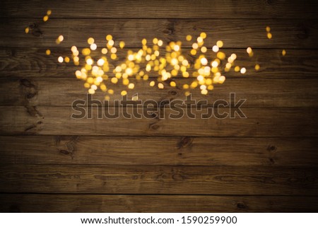 Christmas lights on old wood