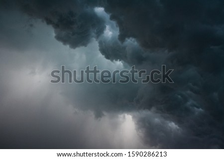 Dark storm clouds, dramatic background Royalty-Free Stock Photo #1590286213