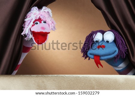 Puppet show on brown background Royalty-Free Stock Photo #159032279