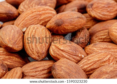 macro almond nuts on a white background close-up