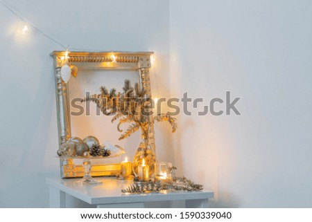 Christmas golden decor in white interior