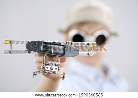 Young boy with toy airplane