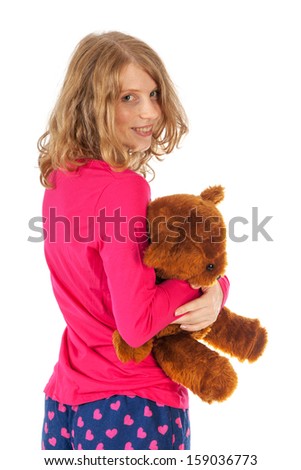 Bed time for girl with teddy bear