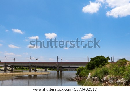 Railway bridge over Muko River in Japan