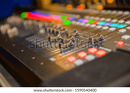 Professional concert mixing console is equipped with high precision and long stroke faders close up,