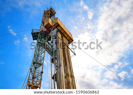 Offshore oil rig drilling platform. Drilling rig in oil field for drilled into subsurface in order to produced crude. Petroleum Industry. Royalty-Free Stock Photo #1590606862