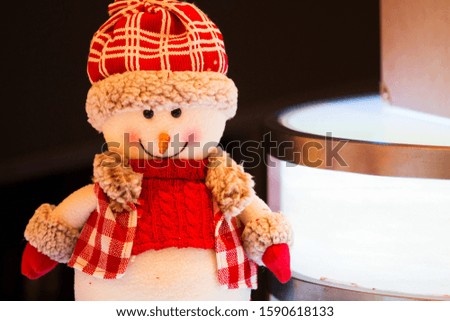 A close-up of a cute Christmas snowman with a smile