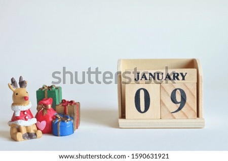 January 9, Christmas, Birthday with number cube design for background.