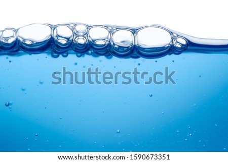 Bubbles Top Motion Water Surface Blue Clean Fresh White Background Macro Art Royalty-Free Stock Photo #1590673351