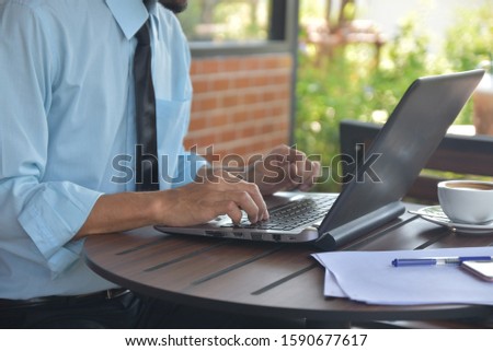 Businessman using computer notebook working by internet online technology,Man typing on computer keyboard