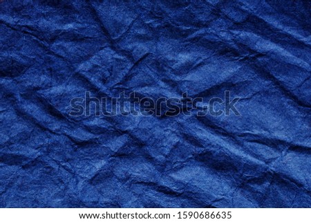 classic blue wrinkled and crumpled  paper, trend color season 2020 