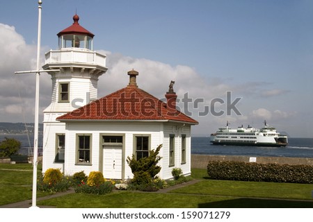Washington State Coastal Lighthouse Nautical Beacon Ferry Boat Transportation Royalty-Free Stock Photo #159071279