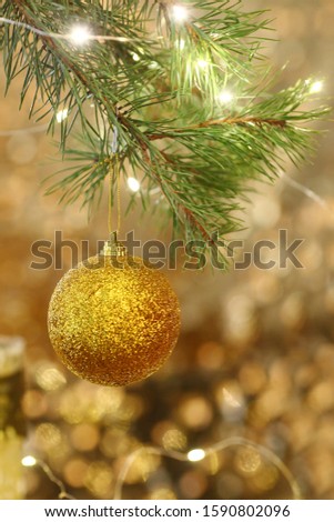 Christmas background with balls and decorations over wooden table