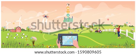 Eco smart farming management with internet of thing system (IOT).Farmer use tablet devices to monitoring farm activities and connect to selling online with drone.Countryside farm in spring or summer. Royalty-Free Stock Photo #1590809605
