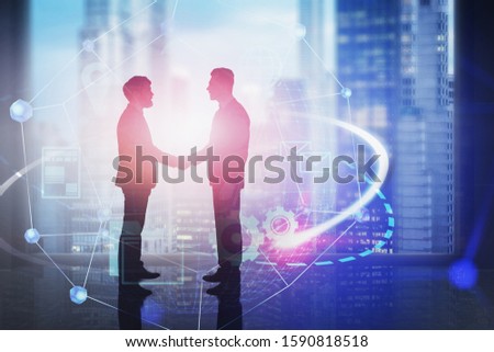 Unrecognizable business partners shaking hands in panoramic office with blurry cityscape and double exposure of network interface. Concept of partnership and hi tech startup. Toned image