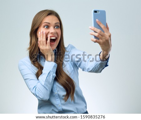 Woman speaks by video call using smartphone. Female isolated portrait.