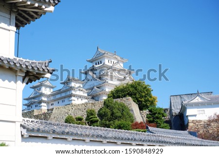 Beautiful Himeji castle or White Heron Castle with blue sky in fall and autumn season, this castle is UNESCO world heritage site, Hyogo Japan.