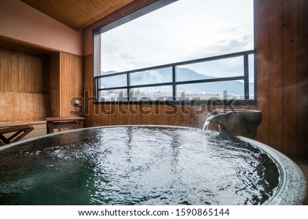 Japanese traditional style shower room named "Onsen", hot spring Royalty-Free Stock Photo #1590865144