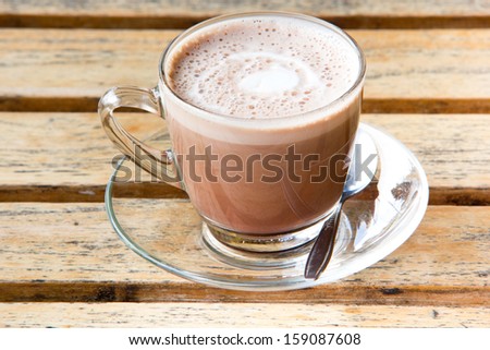 A cup of Hot chocolate on wood table