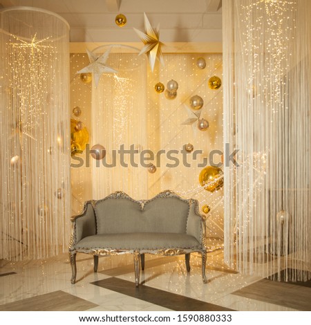 Golden interior with sofa on fantasy fairy tailes backdrop