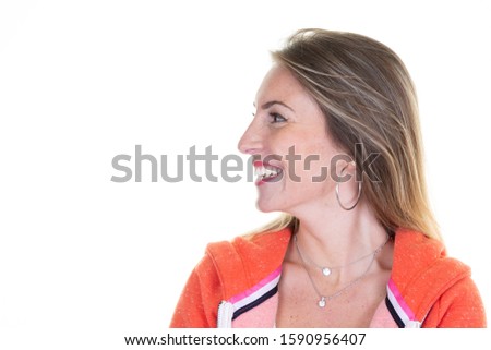 woman excited looking to the side happy young woman looking sideways in excitement Caucasian female model aside white background