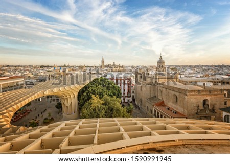 The Cathedral of Saint Mary of the See and Metropol Parasol in Seville, Spain Royalty-Free Stock Photo #1590991945
