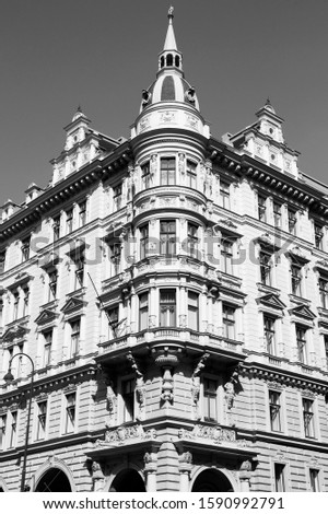 Vienna city, Austria - old apartment building. The Old Town is a UNESCO World Heritage Site. Black and white retro style.