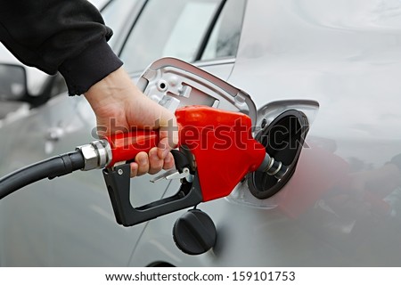 Fuel nozzle with hose isolated on white background Royalty-Free Stock Photo #159101753