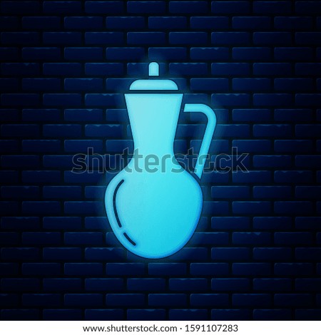 Glowing neon Bottle of olive oil icon isolated on brick wall background. Jug with olive oil icon.  