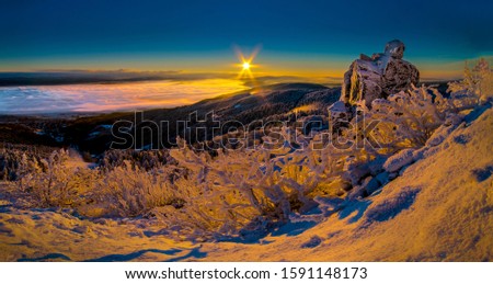 Sunrise and Inversion at Jested mountain close town Liberec, Czech republic, snow and winter and view of funicular, snow corals.