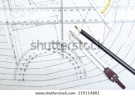 Scheme with compasses rulers and pencil. Close-up photo