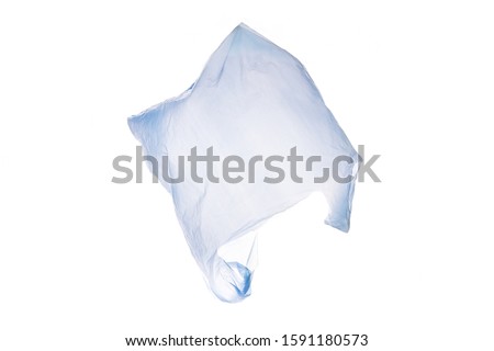 White plastic shopping bag flying over white background, isolated, copy space