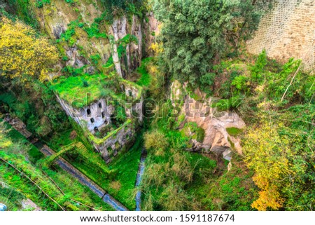 Old Water mill in Valle dei Mulini, Sorrento, Italy Royalty-Free Stock Photo #1591187674