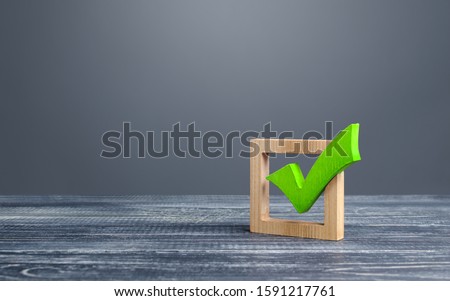 Green voting tick in a box. Checkbox. Democratic elections, referendum. The right to choose, change of power. Checklist for verification and self-discipline. Necessary quality criteria approval symbol