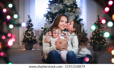 Christmas Close up Portrait of Beautiful Family, Happy Family Concept, Mother with Two Daughters