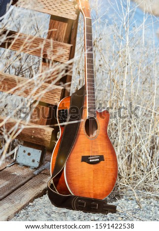 A beautiful guitar on the side of bridge