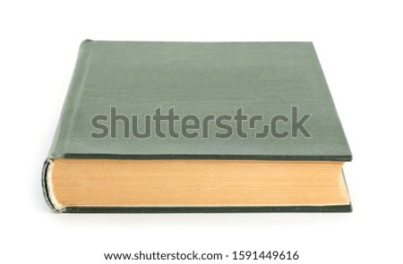 Closed color hardcover book isolated on white