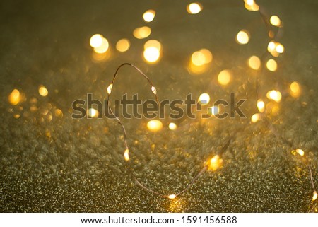 Christamas lights on the golden background