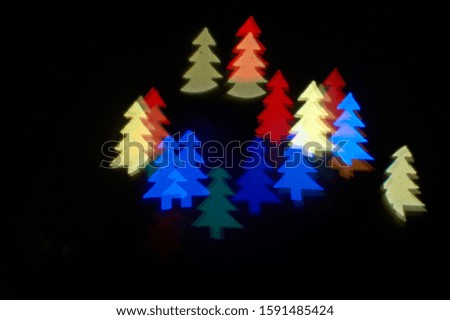 colorful Tree symbol bokeh photo ideal as a background.